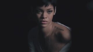 Rihanna Covered Nudity and Side Boob in Behind the Shoot