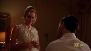 Sunny Mabrey taking off her top and holding her boobs on Mad Men S03E01