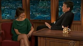 Minka Kelly leggy in green on the Late Late Show