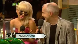 Lady Gaga Cleavage in pink dress at the The Brit Awards
