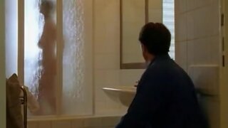 Ursula Buschhorn behind shower door