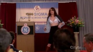 Tina Fey Yanking off her shirt showing her Bra on 30 Rock