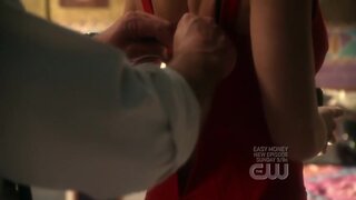 Erica Durance Cleavage and bra strap on Smallville