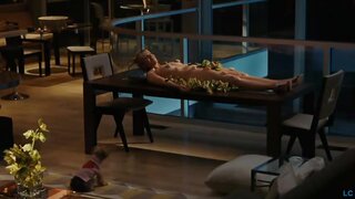 Kim Cattrall with food on her body in Sex And The City Movie