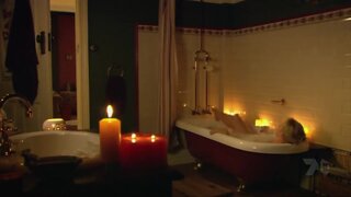 Rebecca Gibney in bathtub from Packed To The Rafters