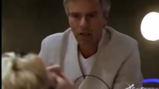 Amanda Tapping nice Cleavage under covers on Stargate SG-1