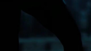 Axelle Carolyn pole dancing in underwear in Doomsday