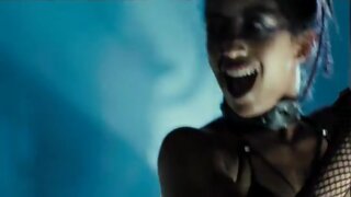 Axelle Carolyn pole dancing in underwear in Doomsday