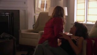 Jennifer Beals and Marlee Matlin kissing each other on the L Word S05 E11