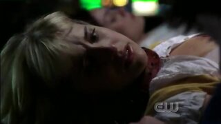Allison Mack showing Bra on Smallville