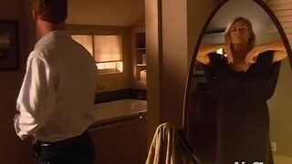 Jenni Baird putting on a dress from The 4400