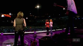 Kelly Clarkson performing at CMA music festival
