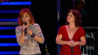 Kelly Clarkson performing at CMA music festival