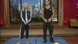 Kelly Ripa working out with a ball