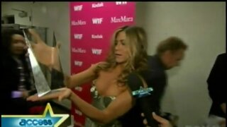Jennifer Aniston Video of her in that amazing Cleavage dress