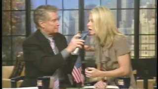 Kelly Ripa showing how she performs oral sex on Regis and Kelly