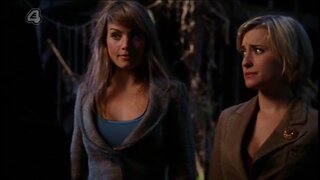 Erica Durance Cleavage and in Boots on Smallville