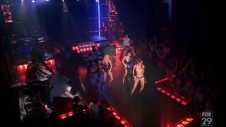 Jaime Lee Kirchner singing in skimpy outfit