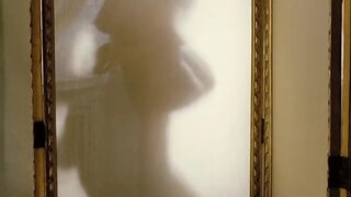 Monica Bellucci Bare Breast and See-Through in Napoleon et moi