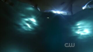 Maggie Q swimming on Nikita S1e10e11