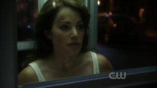 Erica Durance in tank top on Smallville