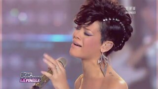 Rihanna in Leather Trousers performing on Star Academy