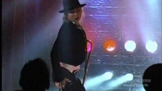 Sarah Carter in Skimpy outfits while stripping in Confessions of a Go-Go Girl