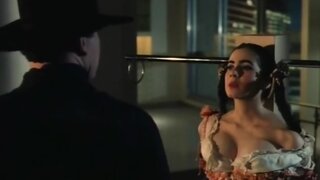 Mia Kirshner Bare Breast and Skimpy in Love and Human Remains