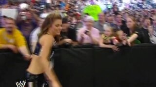 Maria Menounos and Nancy ODell wrestling on WWE RAW